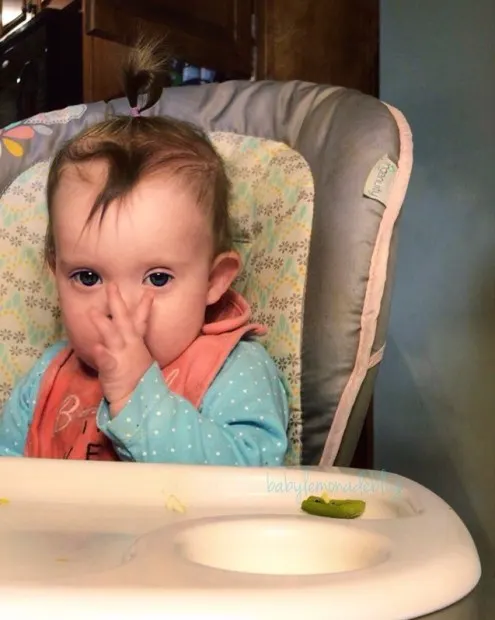 Kara in her highchair, ready for grub